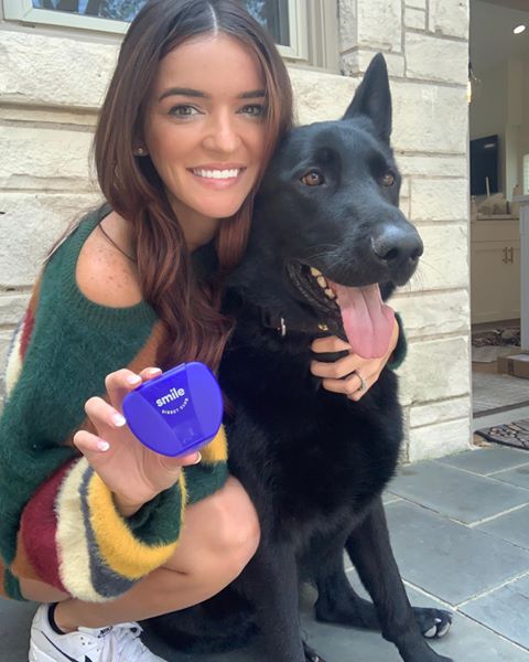 Instagram post by @ravennicolegates for SmileDirectClub. Caption reads: Happy World Smile Day! 🥳🎉 Got Boaz to give me a....