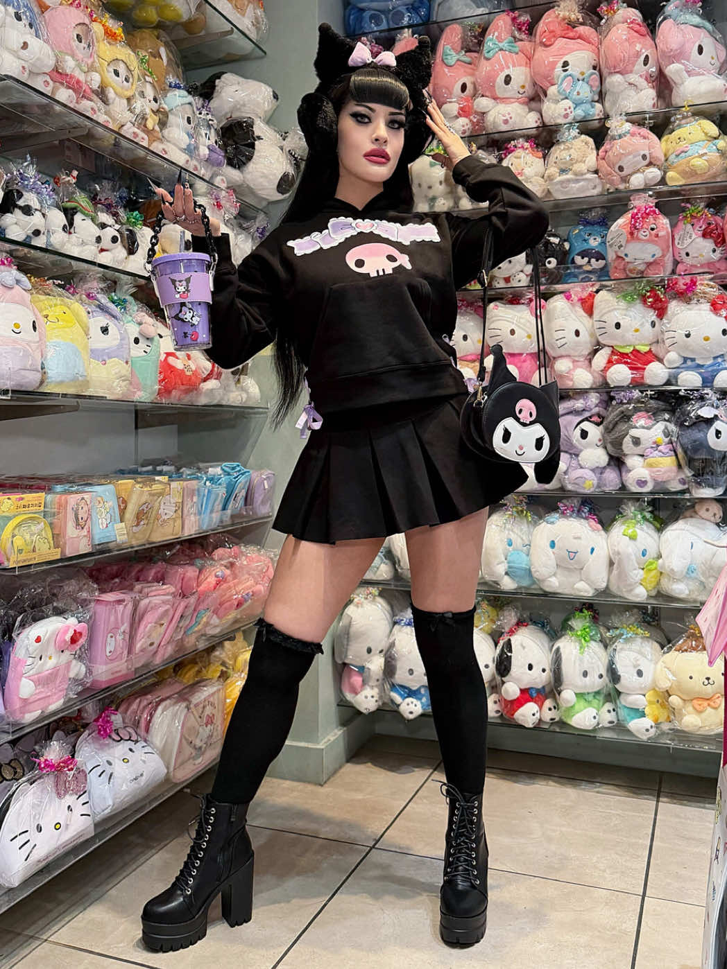 TikTok post by @victoriaveninofficial for Sanrio. Caption reads: 🦇🎀☔️🩷☔️🎀🦇 Sunday Funday Fright 🖤💀🩷 Styled....