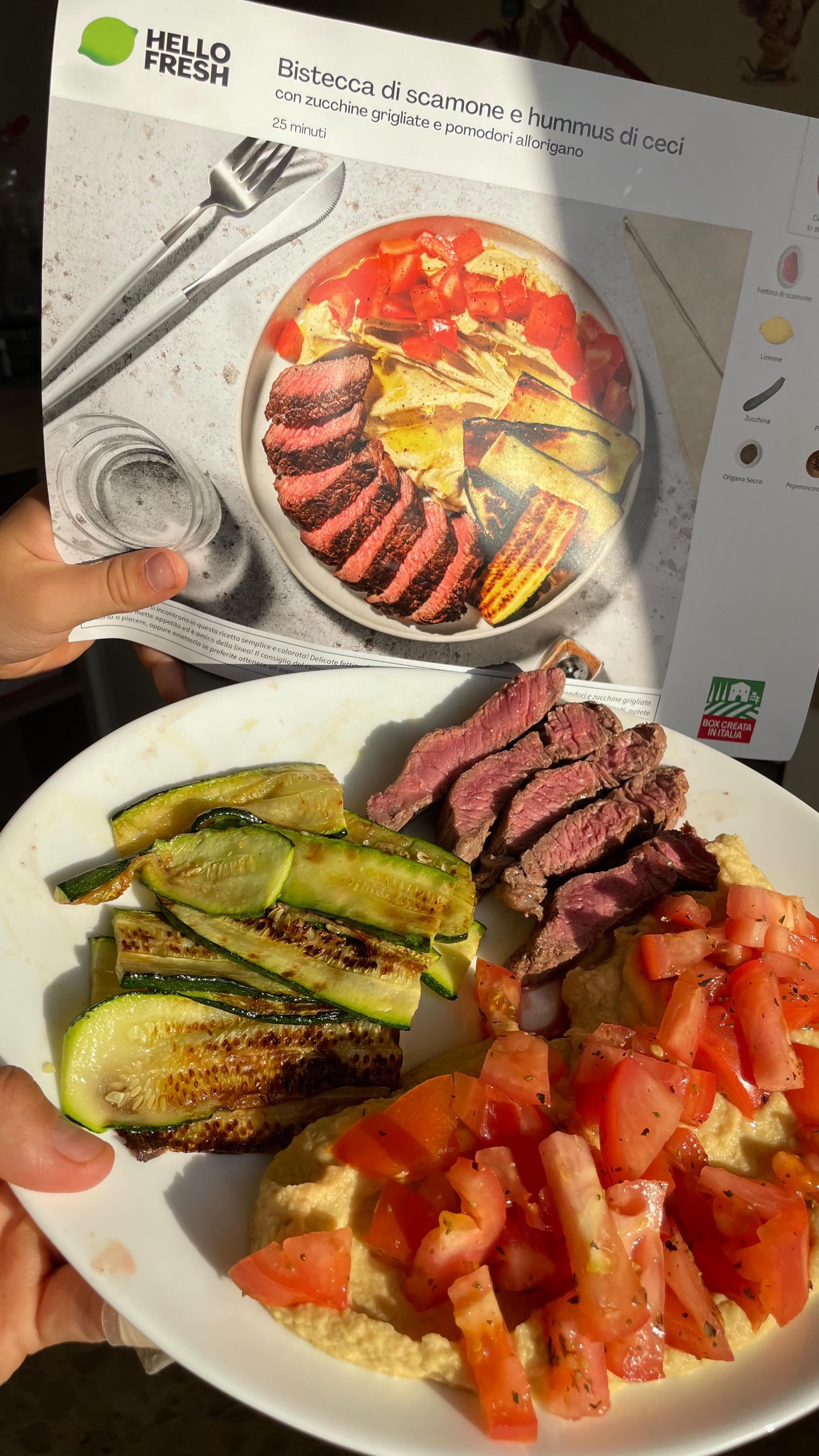 Instagram post by @andreacutrona_99 for HelloFresh. Caption reads: BISTECCA DI SCAMONE E HUMMUS DI CECI con zucchine....