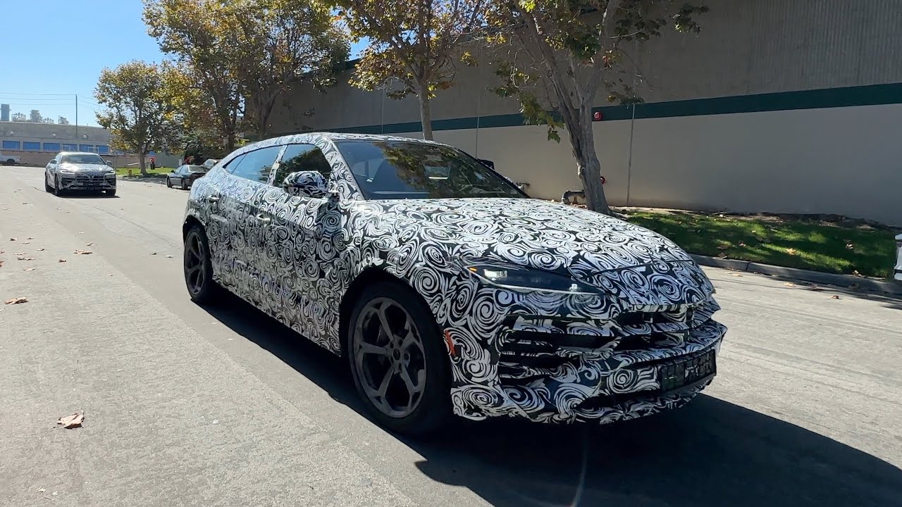 YouTube post by @ddeBehindTheScenes for Immieats. Caption reads: LAMBORGHINI SENDS SECRET NEW PROTOTYPE URUS TO DDE....