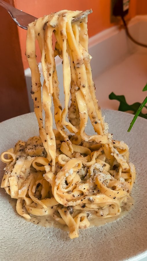 Instagram post by @eatdrinktravlr for Pasta Evangelists. Caption reads: If you love pasta, you need to check out....