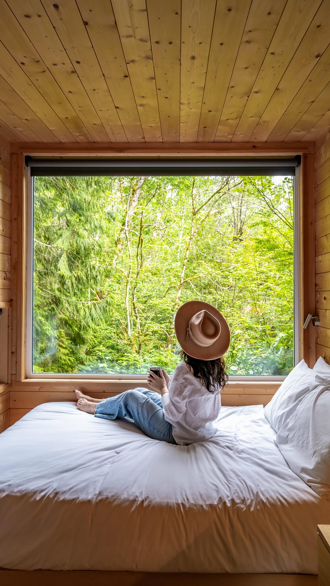 Instagram post by @wanderingbackpack for Postcard Cabins. Caption reads: 📍Getaway House, Skagit Valley: This spot is....