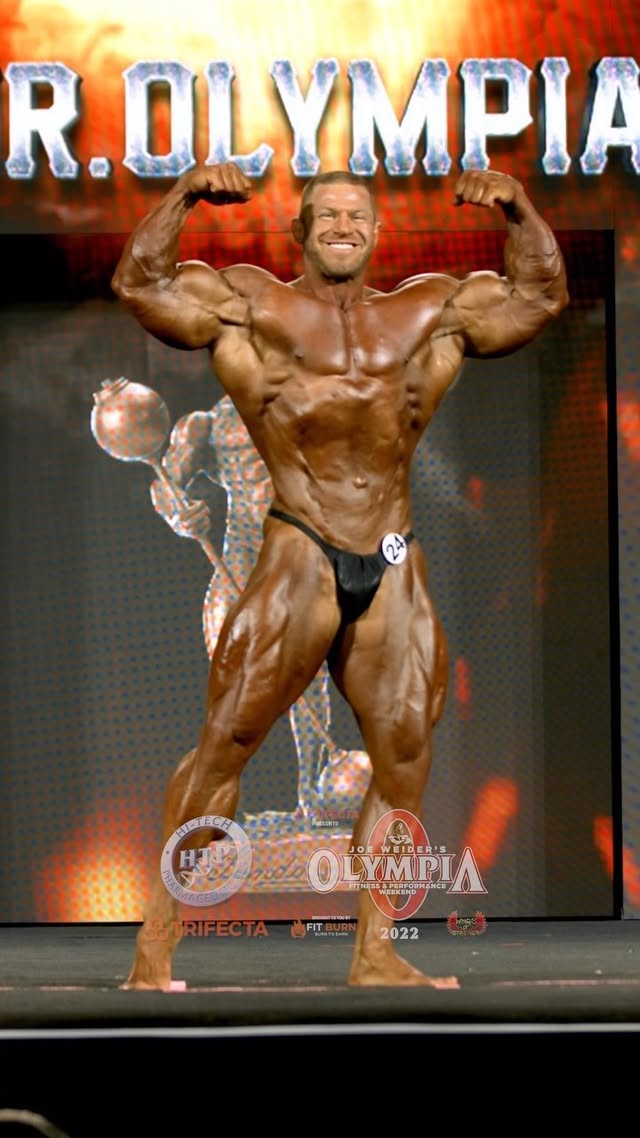 Instagram post by @joelthomas_ifbbpro for Steel Supplements. Caption reads: [...] @mrolympiallc #Olympia2022 @steelsupplements.