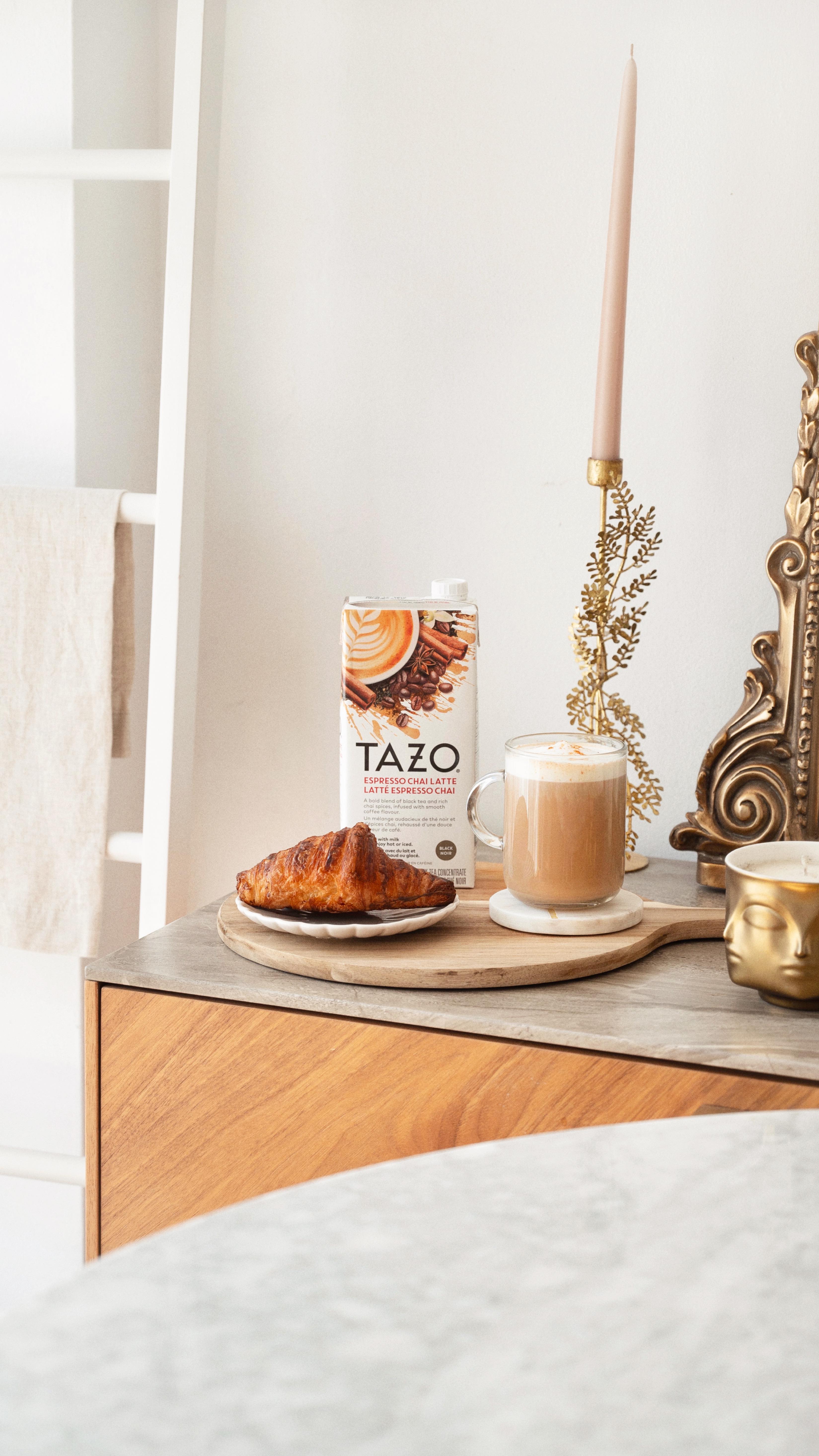 Instagram post by @andrewcretaro for Tazo. Caption reads: Creating a cozy cafe corner at home with....