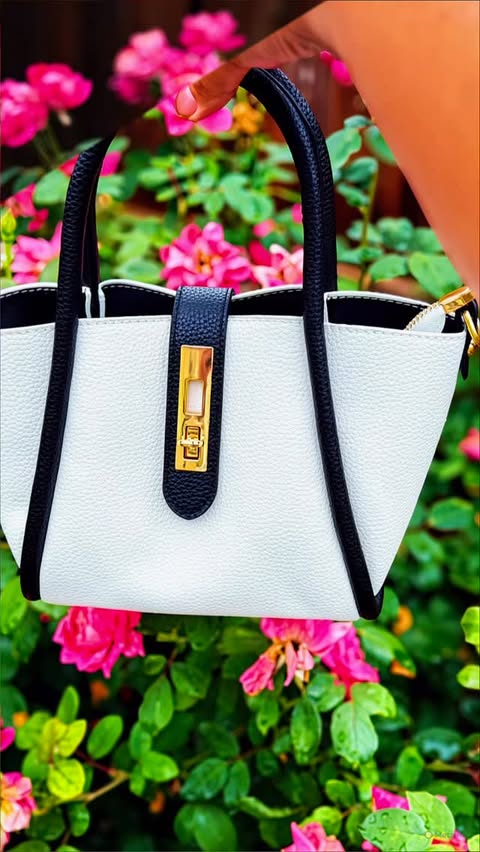 Instagram post by @aavi_divi_mommy for Shein. Caption reads: [...] style, and statement pieces ✨👜 These SHEIN....