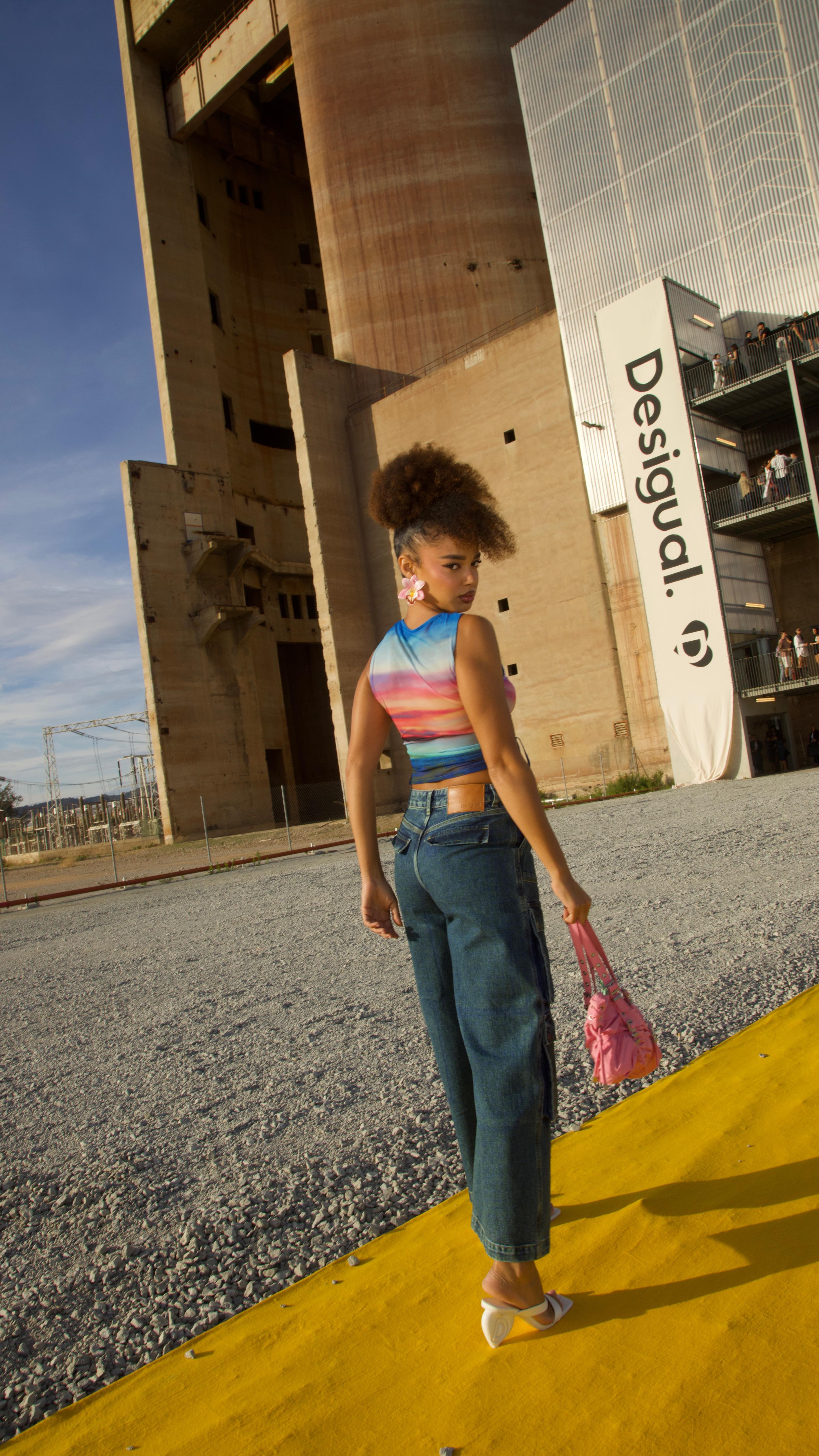 Instagram post by @mikaelaneazesilva for Desigual. Caption reads: Desigual Studio Fashion Show 25 🌟.