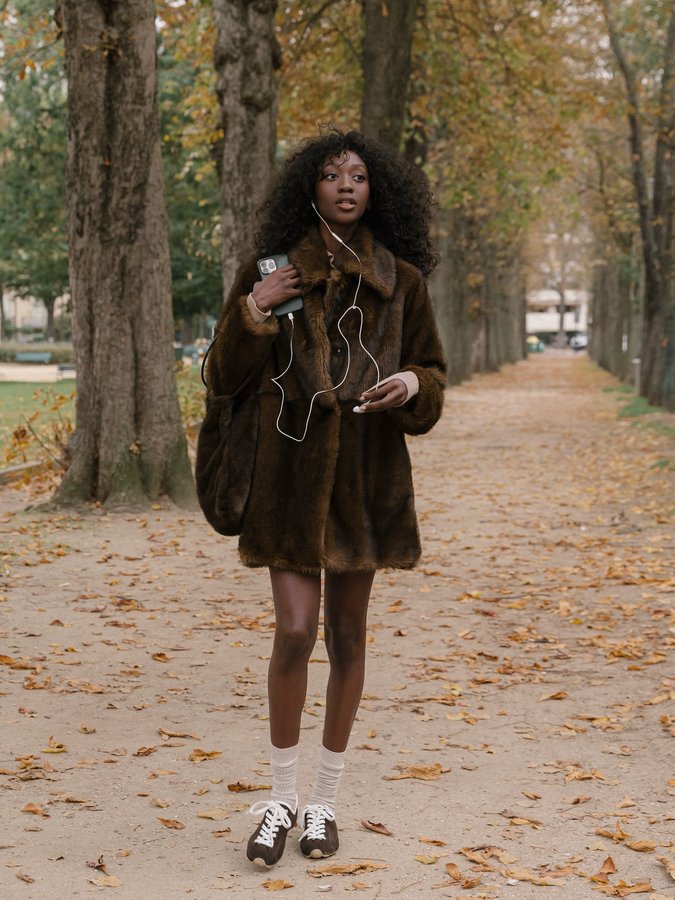 Instagram post by an influencer for Mango. Caption reads: Cozy autumn days wearing @mango #MangoGirls 🍂🍁....