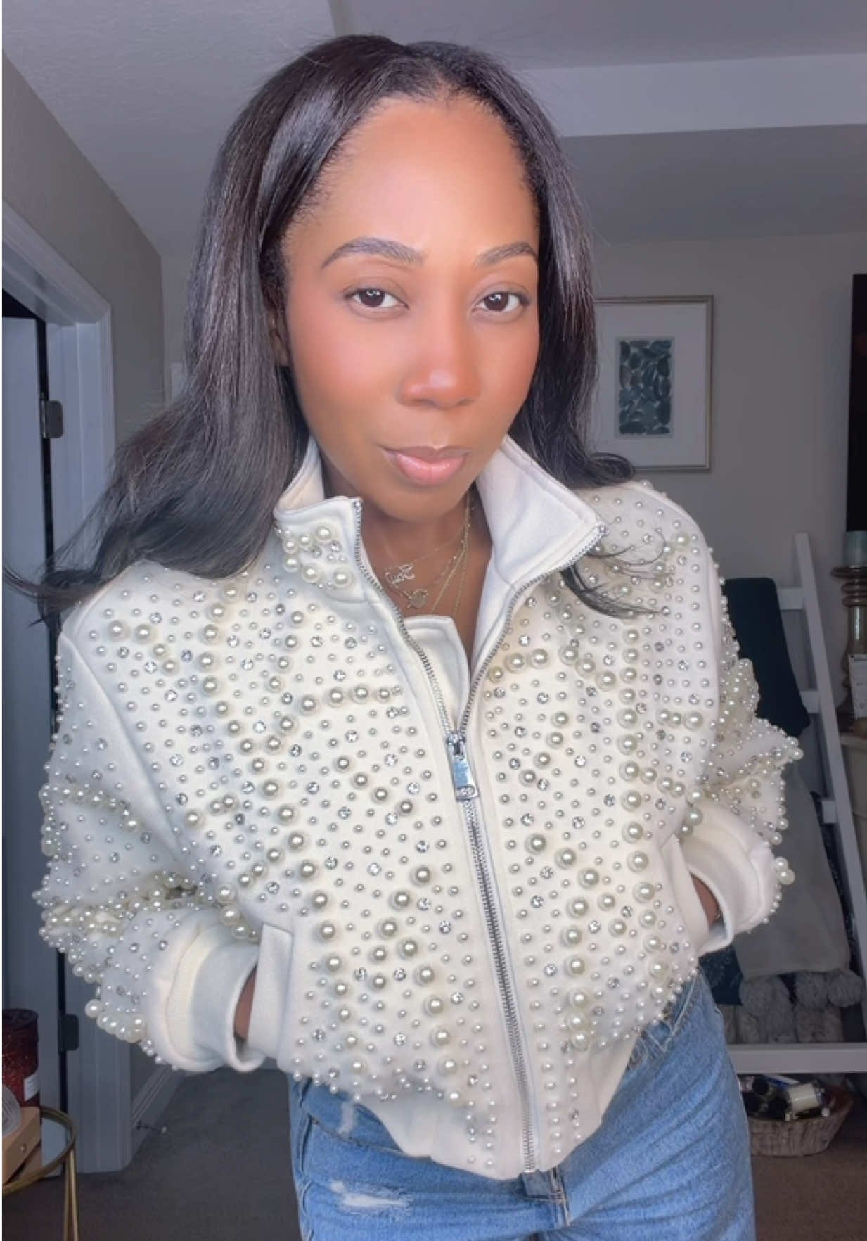 TikTok post by an influencer for AKIRA. Caption reads: This Bomber is 🔥🔥 @AKIRA #akira #shopakira....