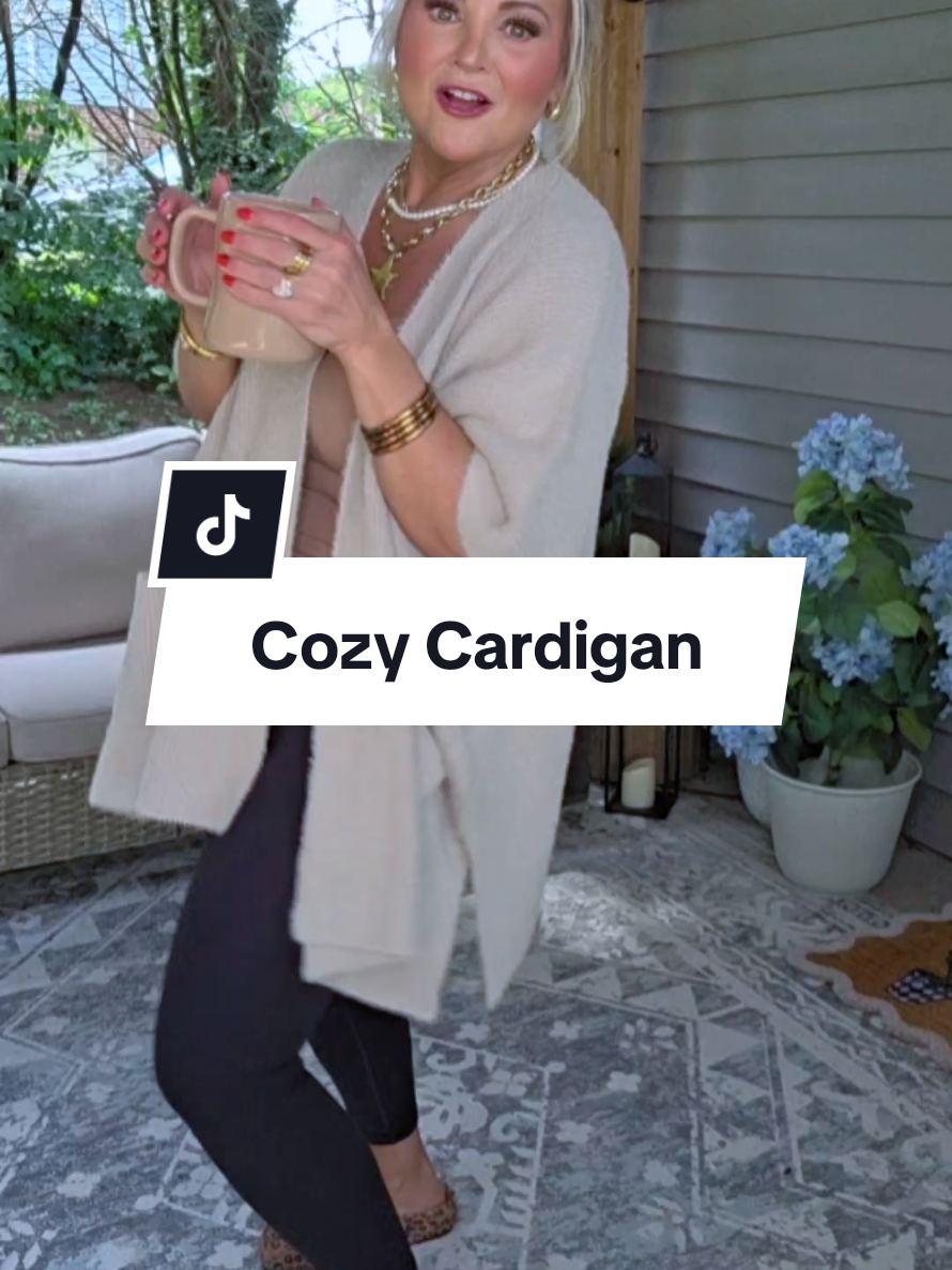 TikTok post by @markiewilliams5 for Fisace Shop. Caption reads: The cardigan you will want on repeat. Perfect for....