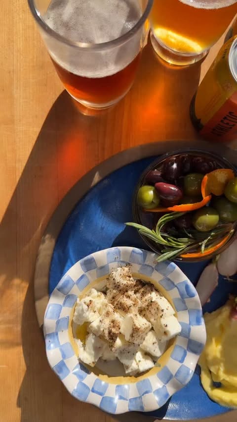 Instagram post by @amandafrederickson for Athletic Brewing Co. Caption reads: My go-to spread when people are coming over.....