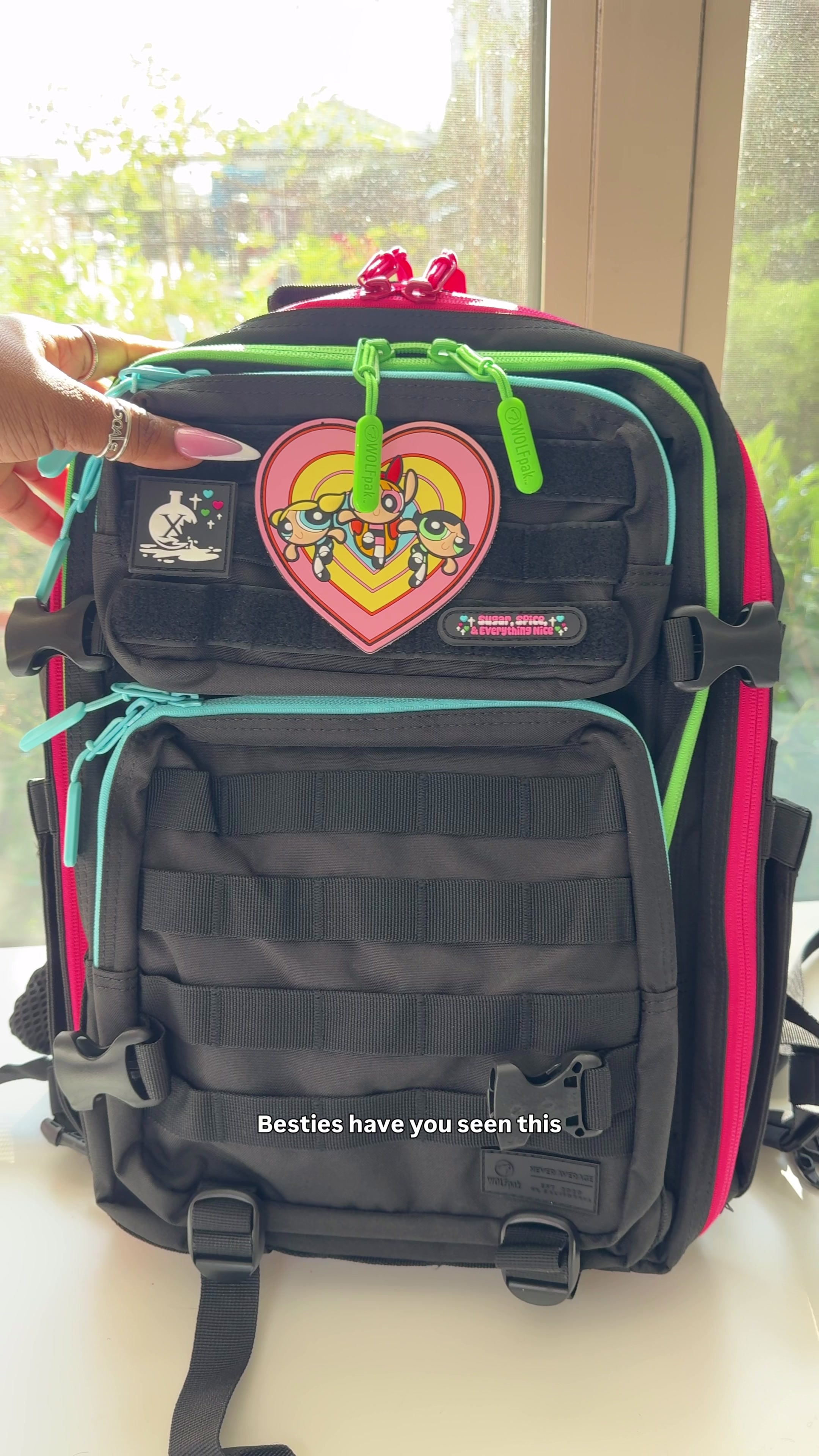 TikTok post by @rittenhouseart for WOLFpak. Caption reads: [...] the perfect tech friendly backpack from....
