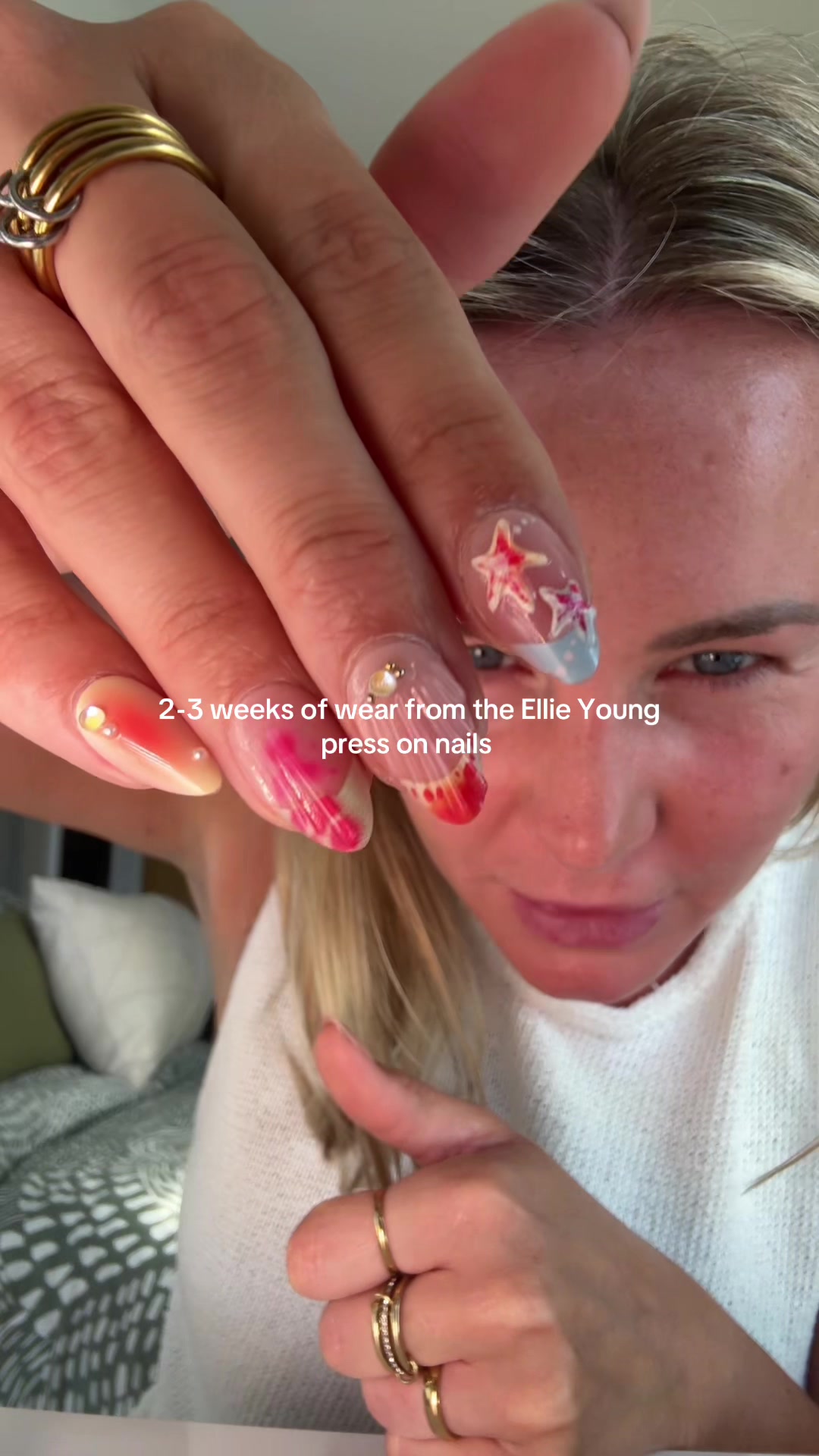 TikTok post by @emmatwinmum for Ellie Young Beauty Shop. Caption reads: Long wear press on nails by @Ellie Young Nails Ltd....