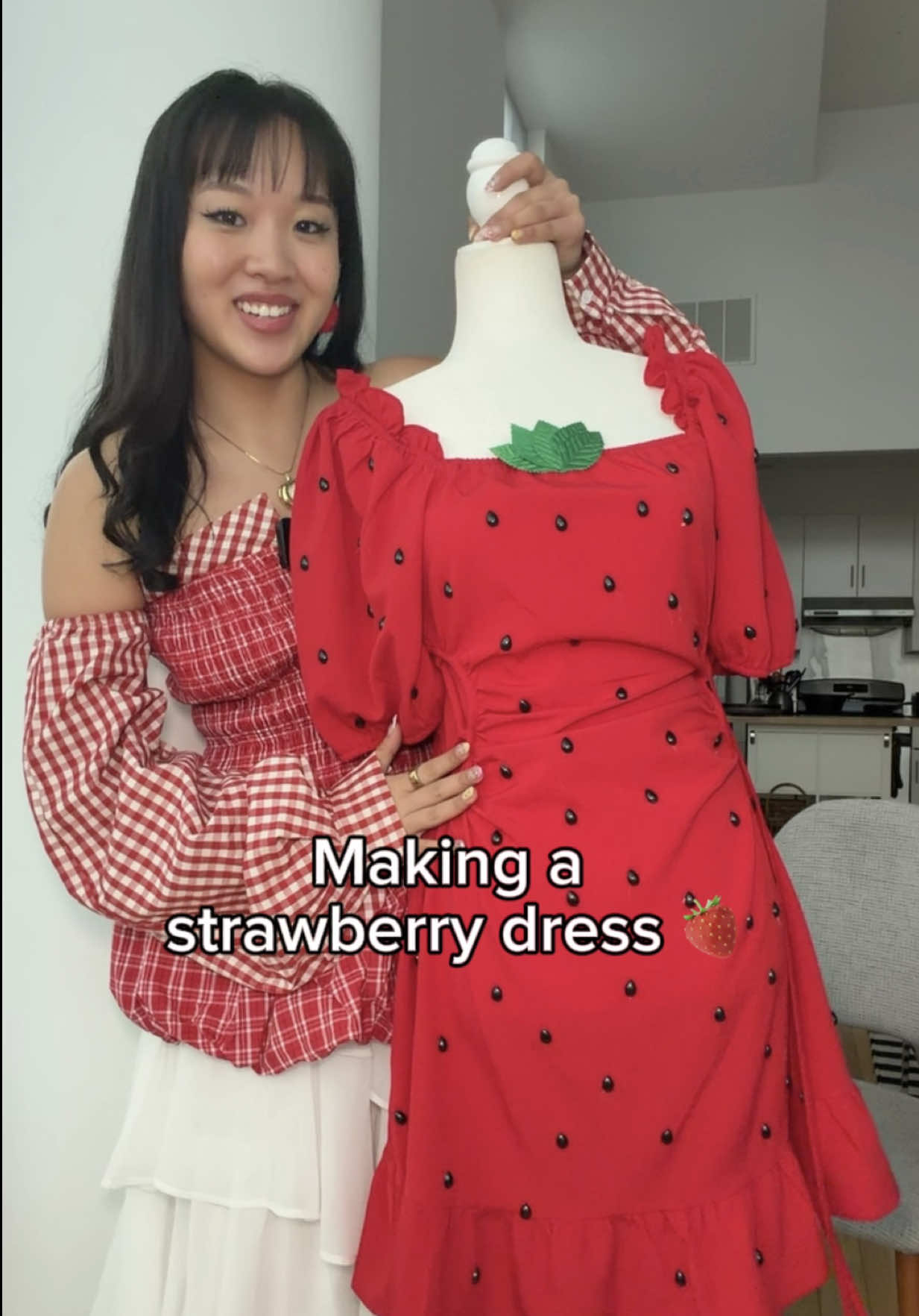 TikTok post by @kalitaku for BURGA. Caption reads: [...] into a strawberry dress inspired by my....