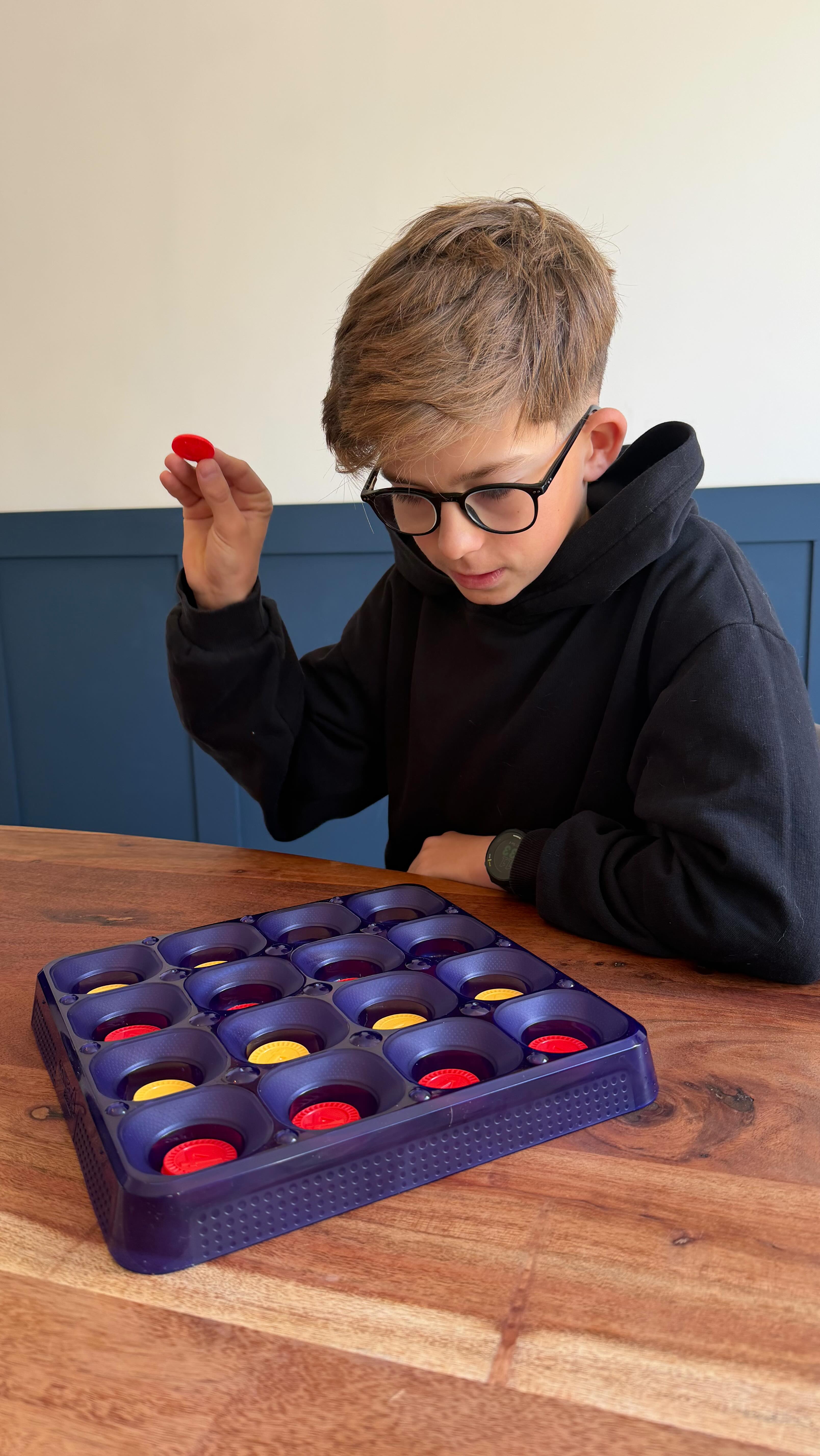 Instagram post by @rolandhall for Hasbro. Caption reads: #ad What’s your game? Turns out Connect4 Frenzy....