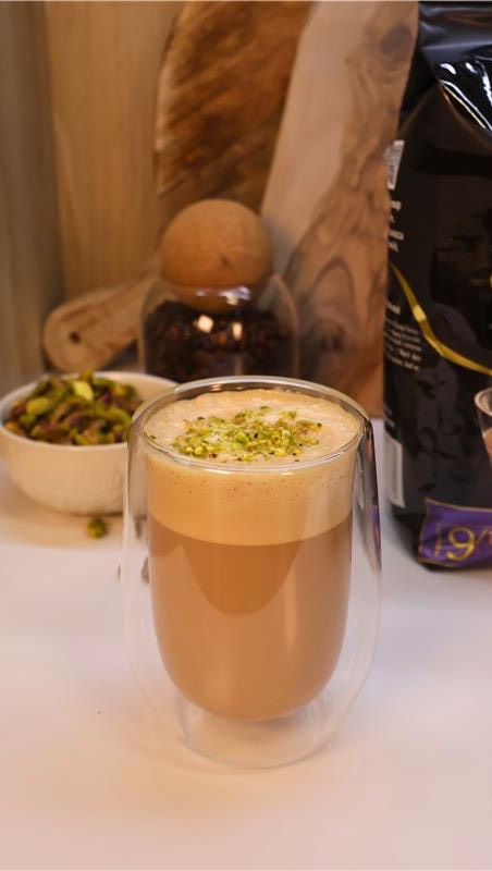 Instagram post by @smeg_uk for Lavazza. Caption reads: Why not try a pistachio latte this autumn?....