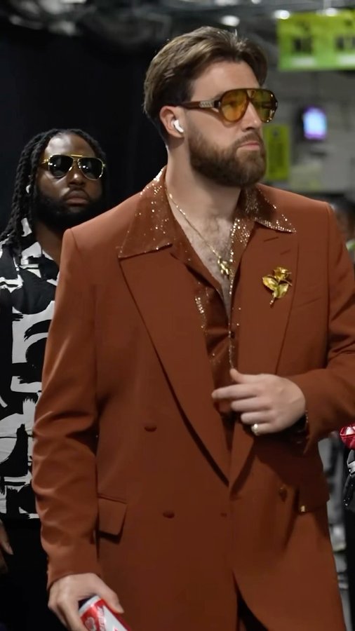 Instagram post by @askantonioo for AMIRI. Caption reads: Sooooo we did a thing 🤓 Travis in custom AMIRI....