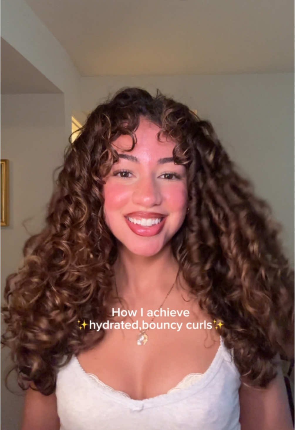 TikTok post by @lacassandra_ for Cantu Beauty. Caption reads: Achieving the most for my curls with the least....