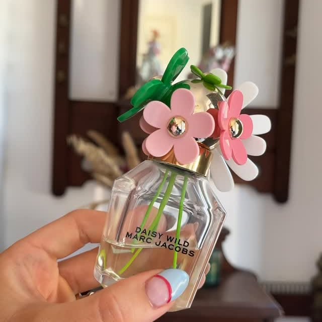 Instagram post by @misshallahan for Marc Jacobs Fragrances. Caption reads: Outfit of the day 🌸🌼. 
@lovetheflamingo1 outfit....