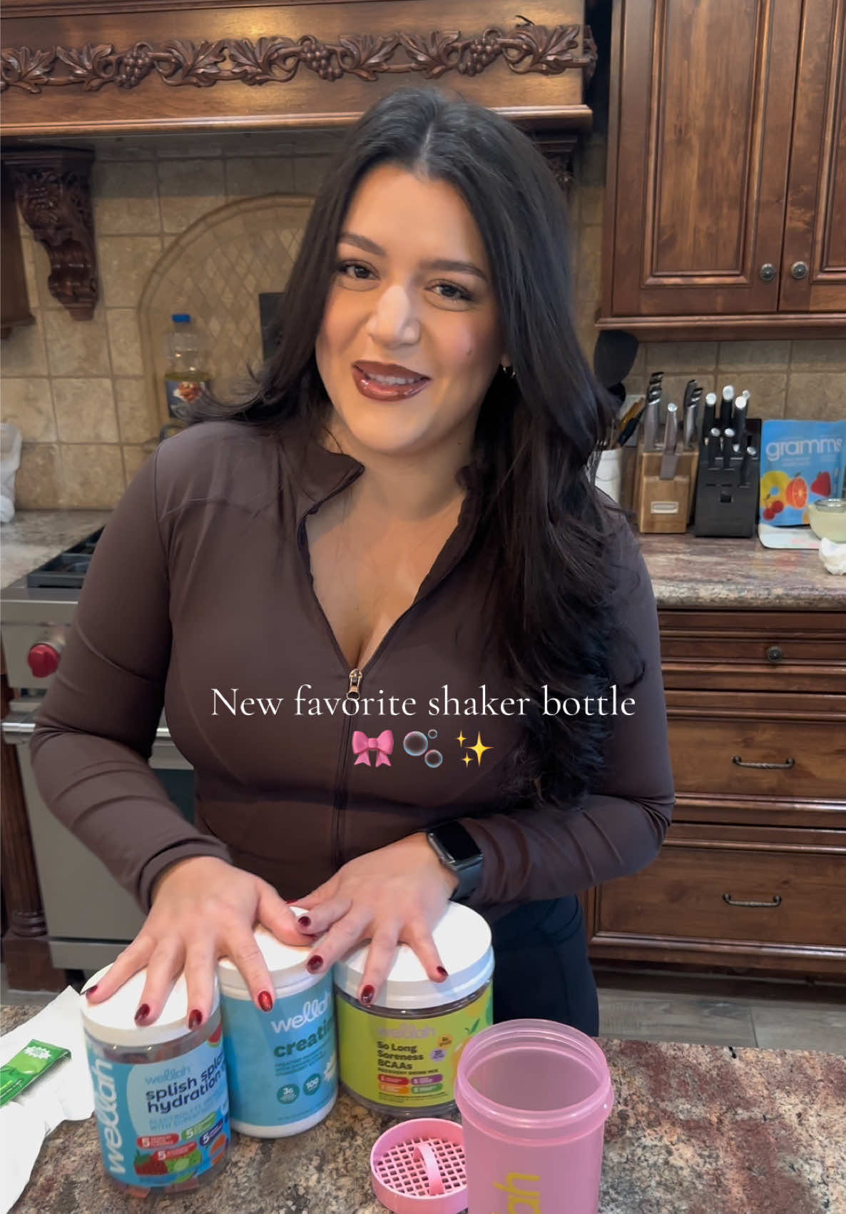 TikTok post by @nessanunez_ for Wellah Nutrition. Caption reads: My new favorite shaker bottle from @Wellah....