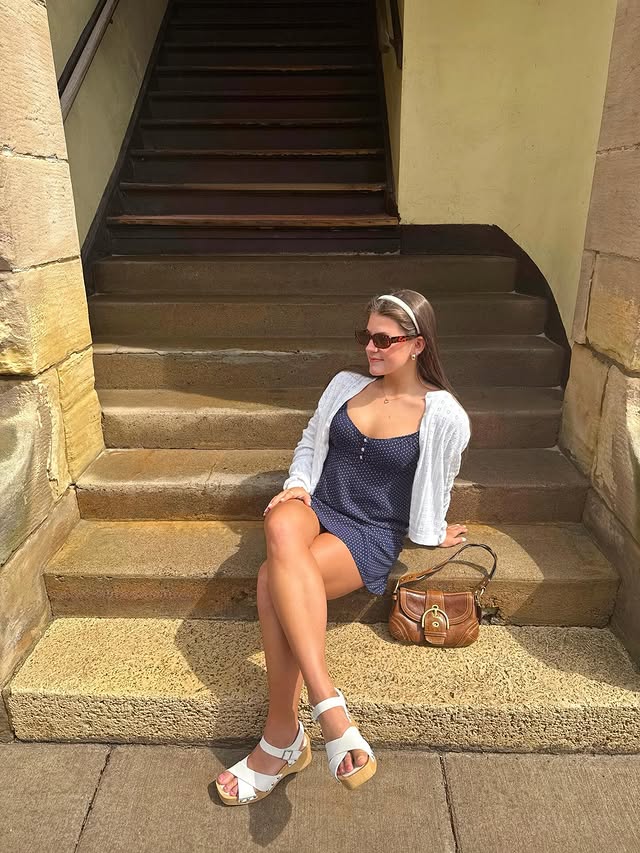 Instagram post by @elliefisherr for BEARPAW. Caption reads: stepping into spring w/ my @bearpawshoes sandals....