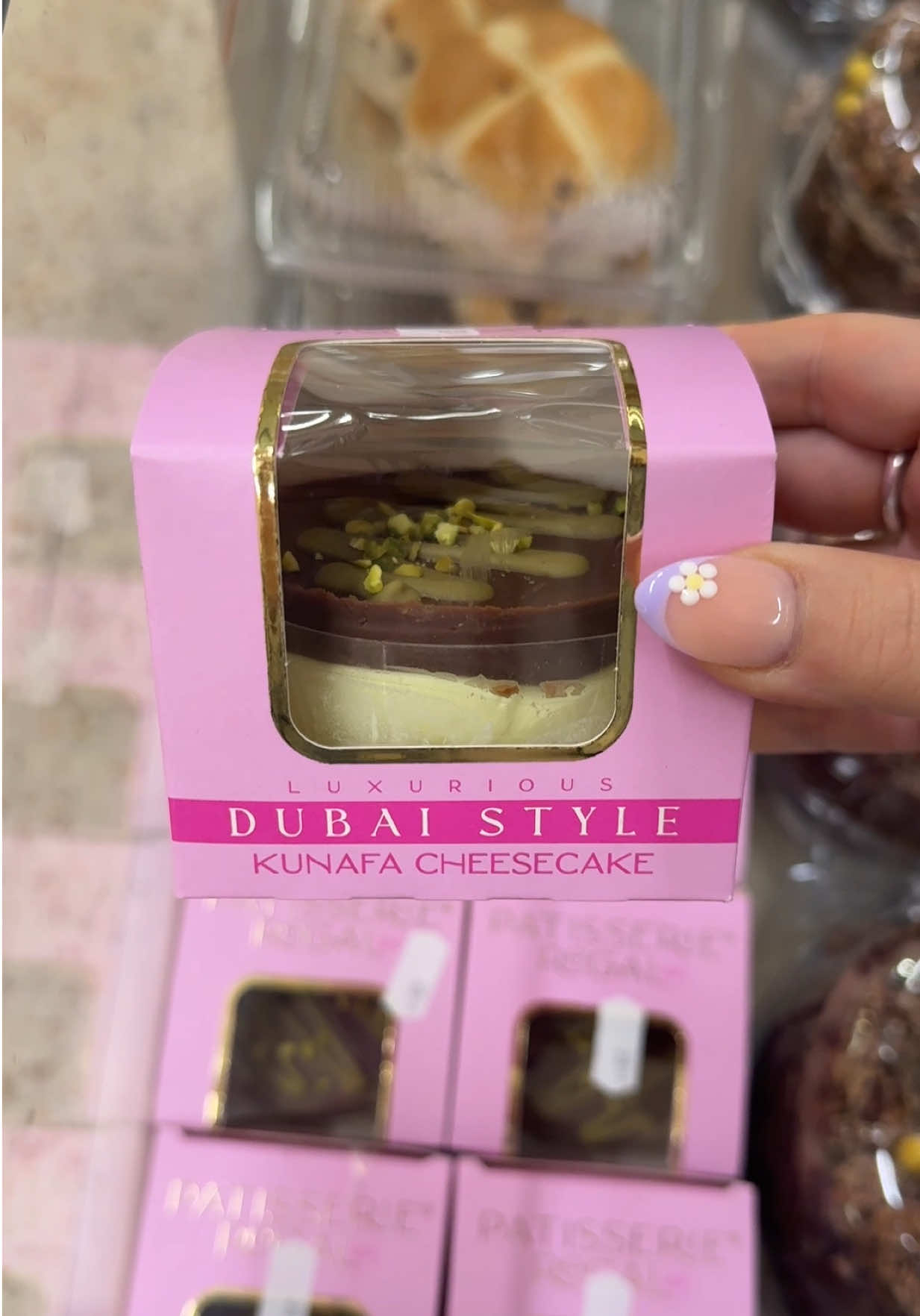 TikTok post by @newfoodspotteruk for Morrisons. Caption reads: DID SOMEONE SAY DUBAI STYLE CHEESECAKE?!?!?!....
