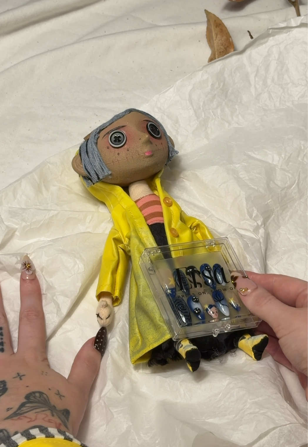 TikTok post by @leannegoodall_ for Ersa Nails. Caption reads: [...] dolls and trap doors, she’d shop at @Ersa....