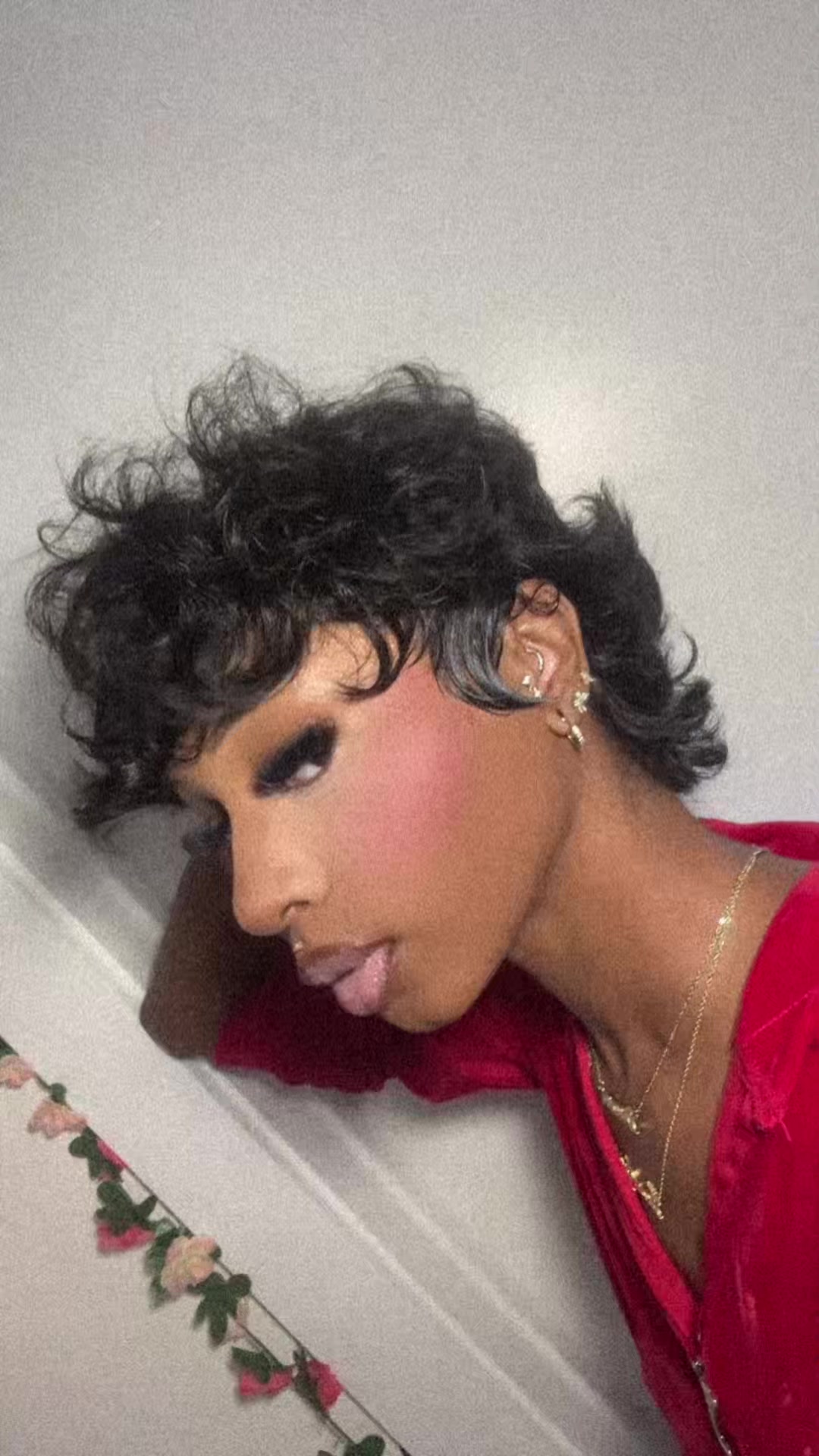 TikTok post by @dreamdoesitall for Showreal Human Hair. Caption reads: I’ve been wanting a pixie mullet for so long I had....