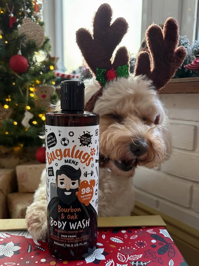 Instagram post by @adventuresofpipthecavapoochon for Bugalugs Pet Care. Caption reads: Why does Santa use @bugalugspetcare Body Wash at....
