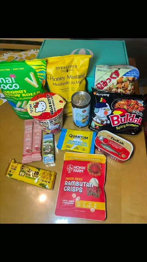 Instagram post by @munchingwithmarina for Try The World. Caption reads: #sponsored Got another @trytheworld box with a....
