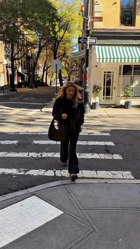 Instagram post by @victoriahiegel for Coach. Caption reads: the perfect bag when I’m out and about in NYC #nyc....