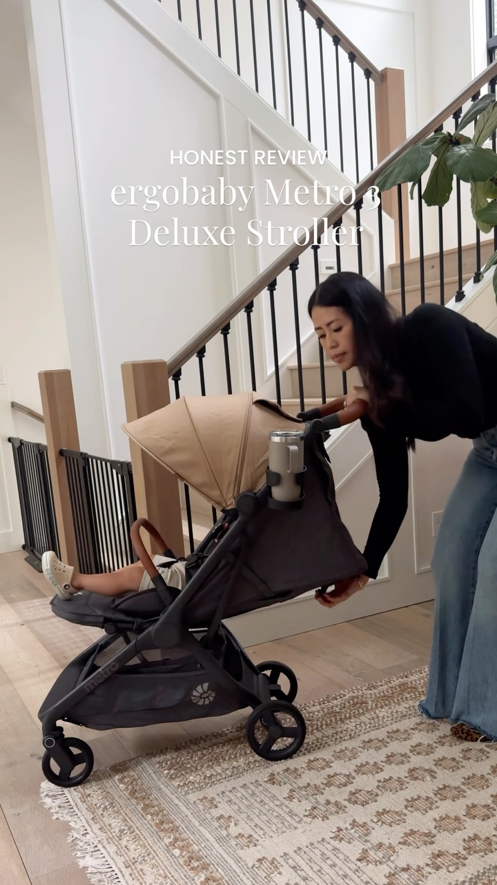 Instagram post by @thesabrinatan for Ergobaby. Caption reads: Comment “stroller” to shop! Travel strollers....