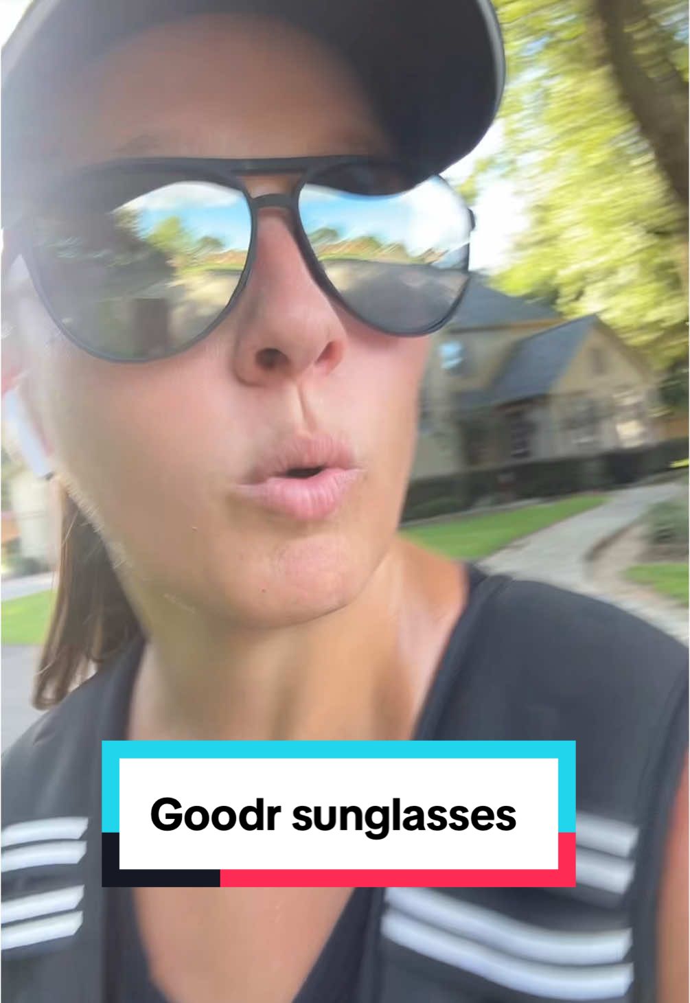 TikTok post by @elizabethlott8 for Goodr. Caption reads: These @goodr polarized glasses were a [...].
