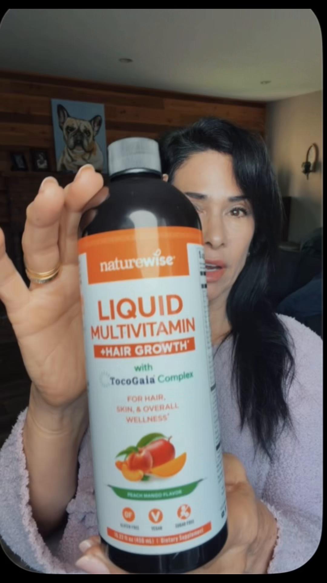 TikTok post by @anitabartram for NatureWise. Caption reads: NatureWise Grow Back Bundle - Liquid Multivitamin....
