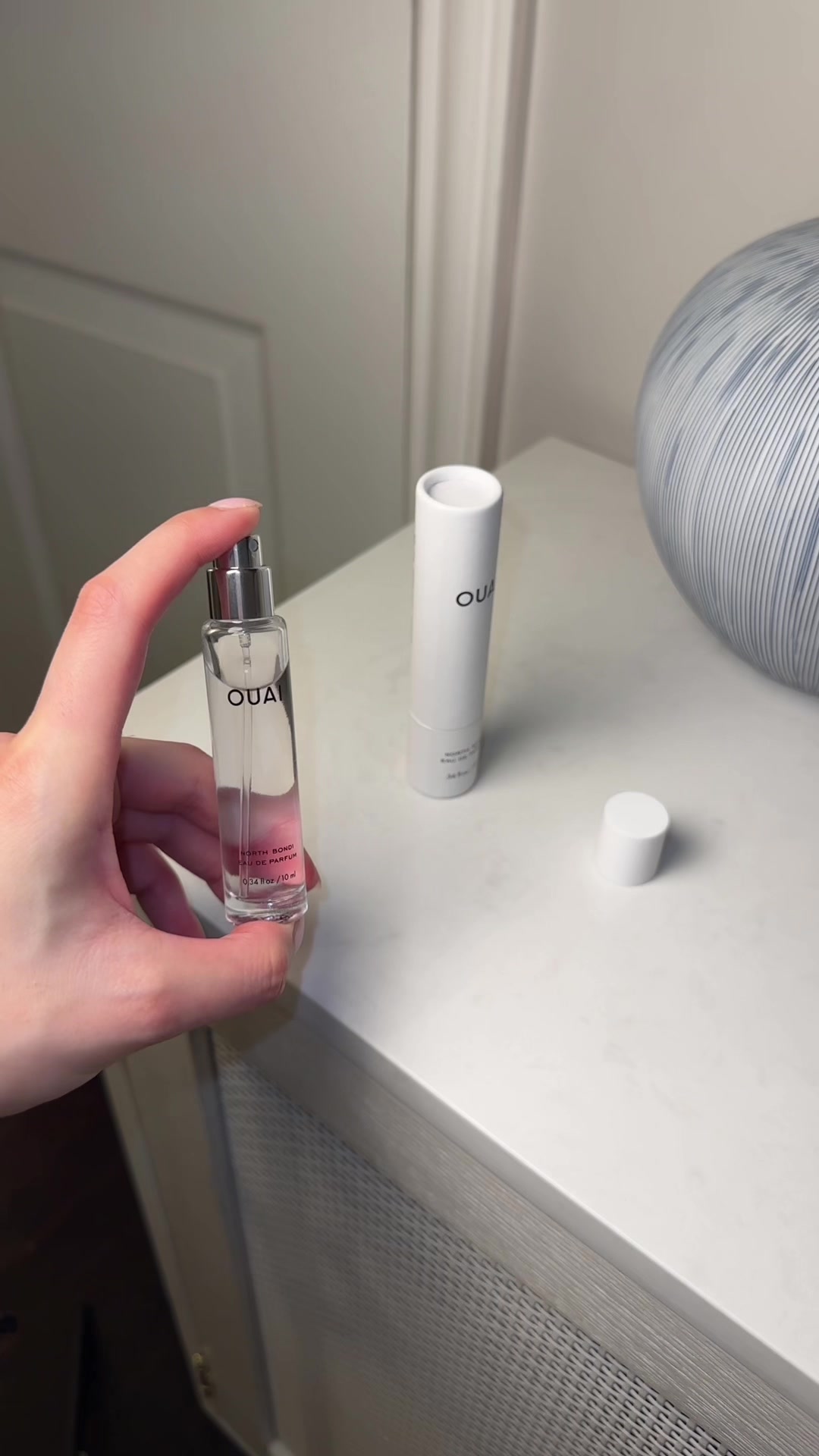 TikTok post by @psychictexas for OUAI. Caption reads: [...] north bondi fragrance ✨ @THE OUAI #fyp....