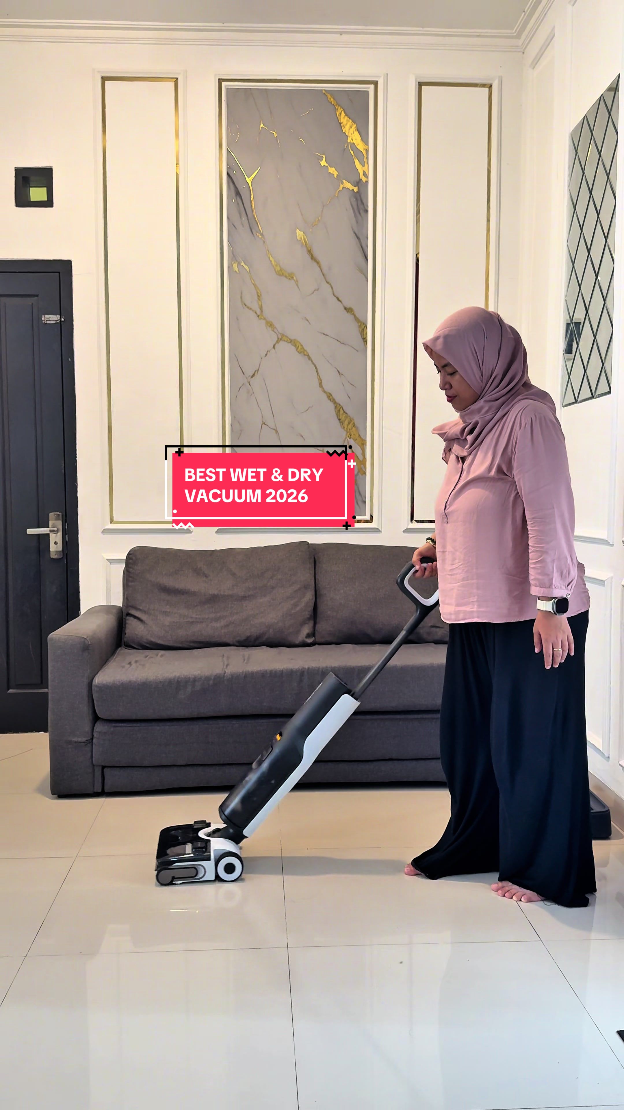 TikTok post by @caesar.anggi for Roborock. Caption reads: BEST WET & DRY VACUUM 2026 @Roborock Indonesia....