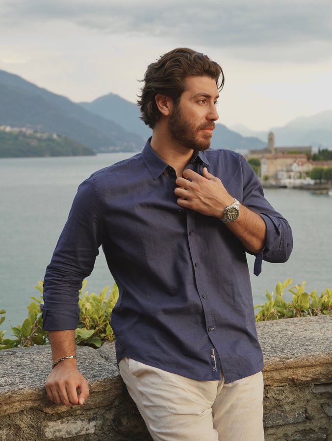 Instagram post by @omer.elomari for Polo Club. Caption reads: @poloclub on Como, where time slows and style....