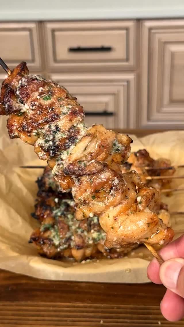 Instagram post by @ninjacue for Kingsford. Caption reads: Garlic Parmesan Chicken Skewers 🔥 

Garlic butter....