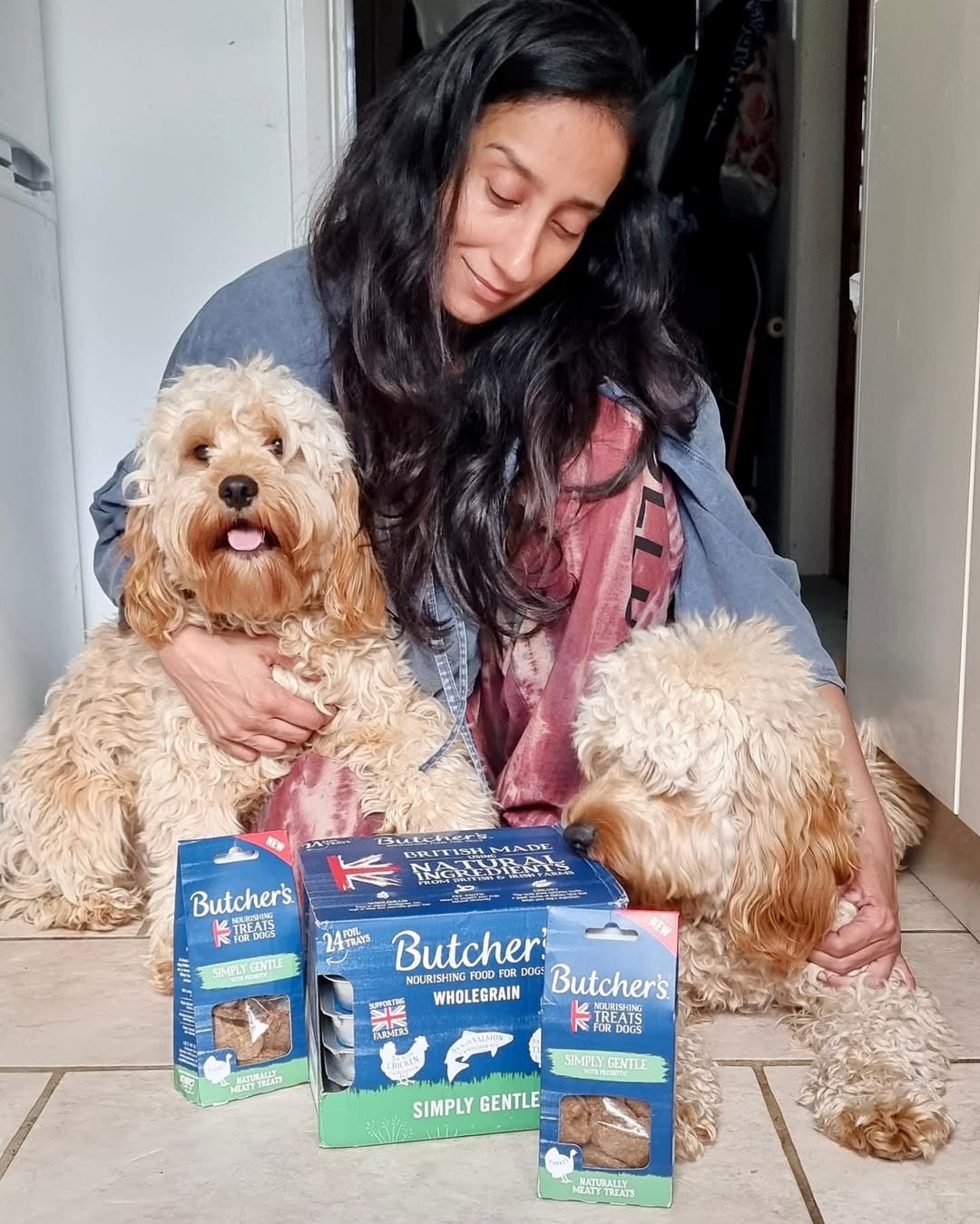 Instagram post by @allaboutatima for Butcher's Dog Food. Caption reads: #ad The boys have been loving the transition to....
