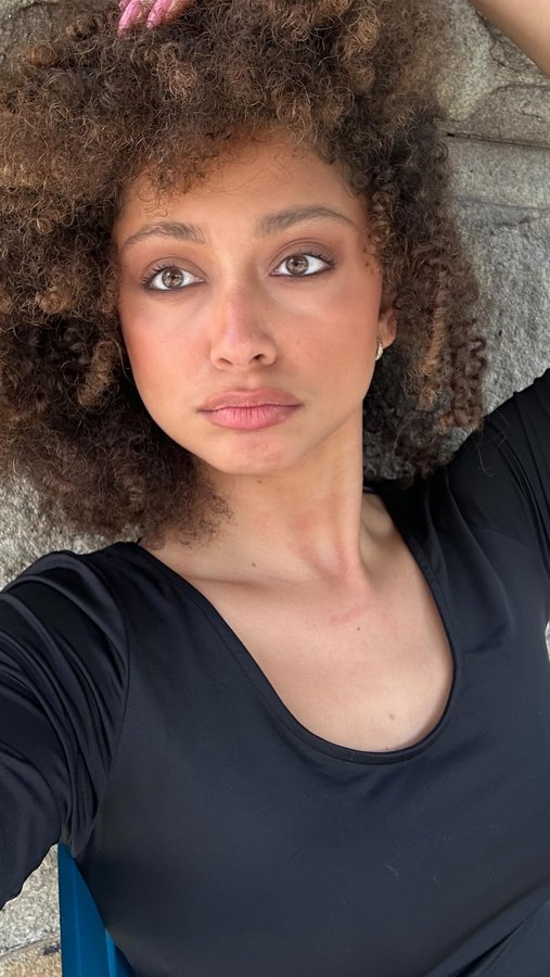 Instagram post by @theparisfrancisca for Aussie Hair. Caption reads: #ad #aussiepartner A curly girl NEVER keeps her....