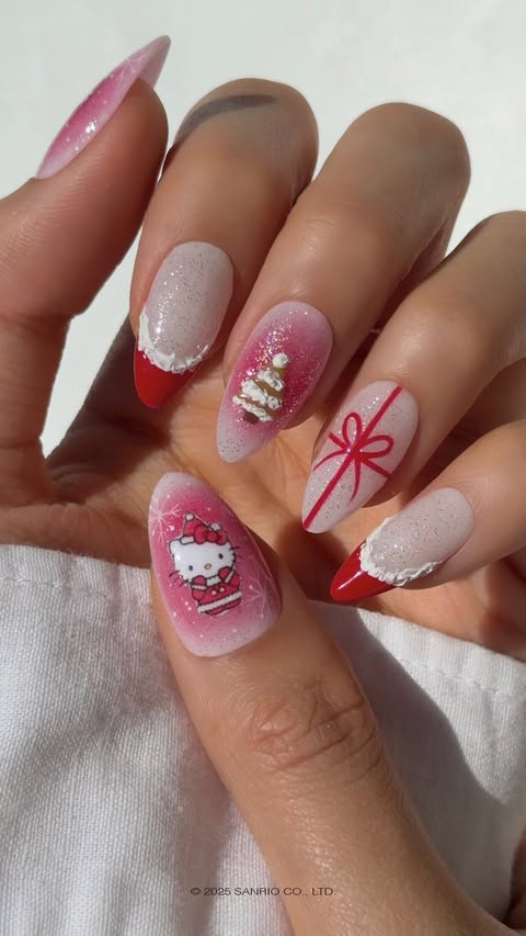 Instagram post by @concon_wi for Hello Kitty. Caption reads: Hello Kitty Holiday Nails🎄❄️💅

I’m so excited to....