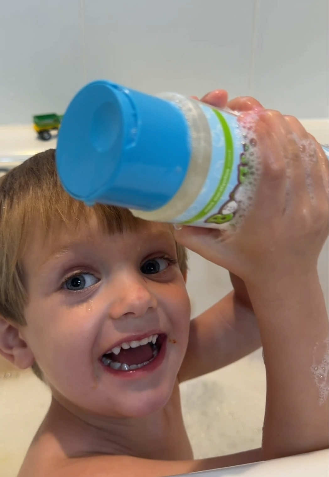 TikTok post by @loganwgentry for Boogie Wipes. Caption reads: Toddler bath rule #1: there can never been too....