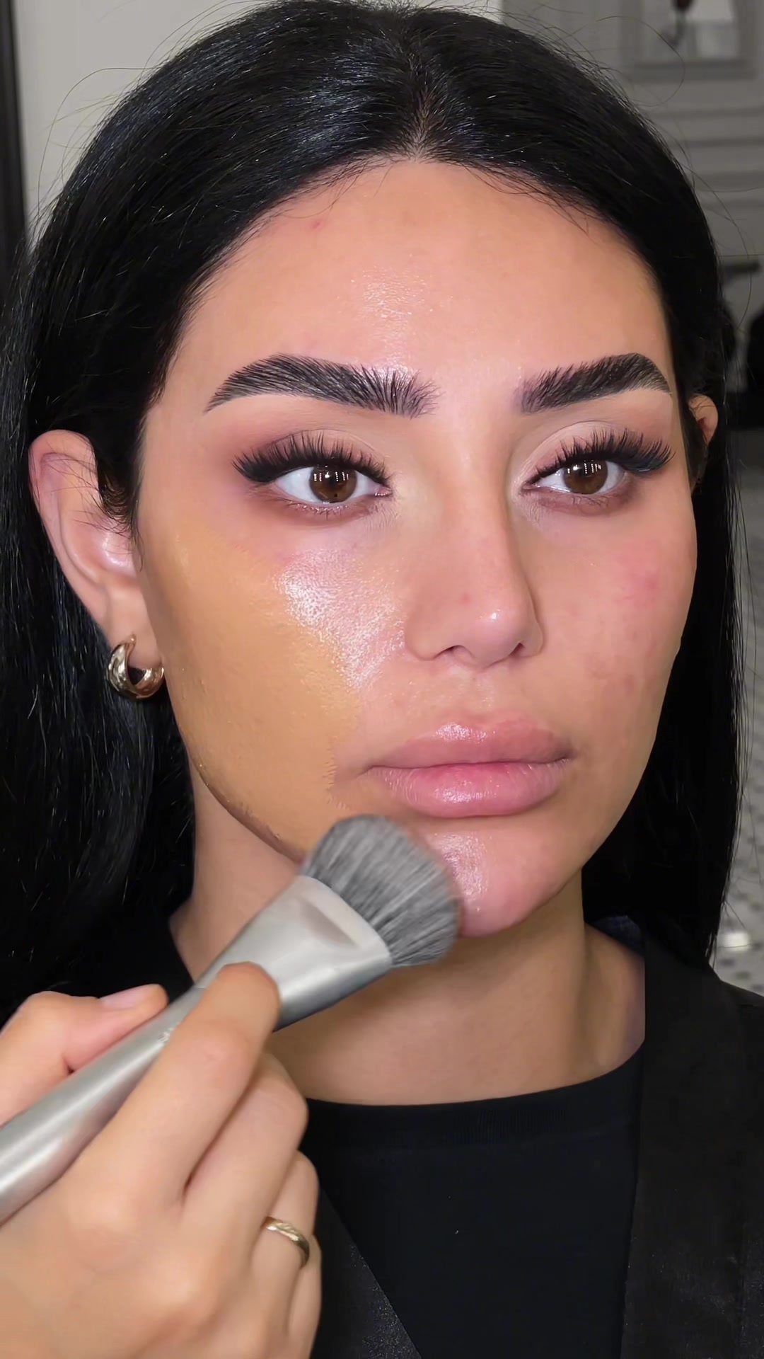 TikTok post by @allyykaya for MADE BY MITCHELL. Caption reads: Base products:  @Embryolisse face cream • @Huda....