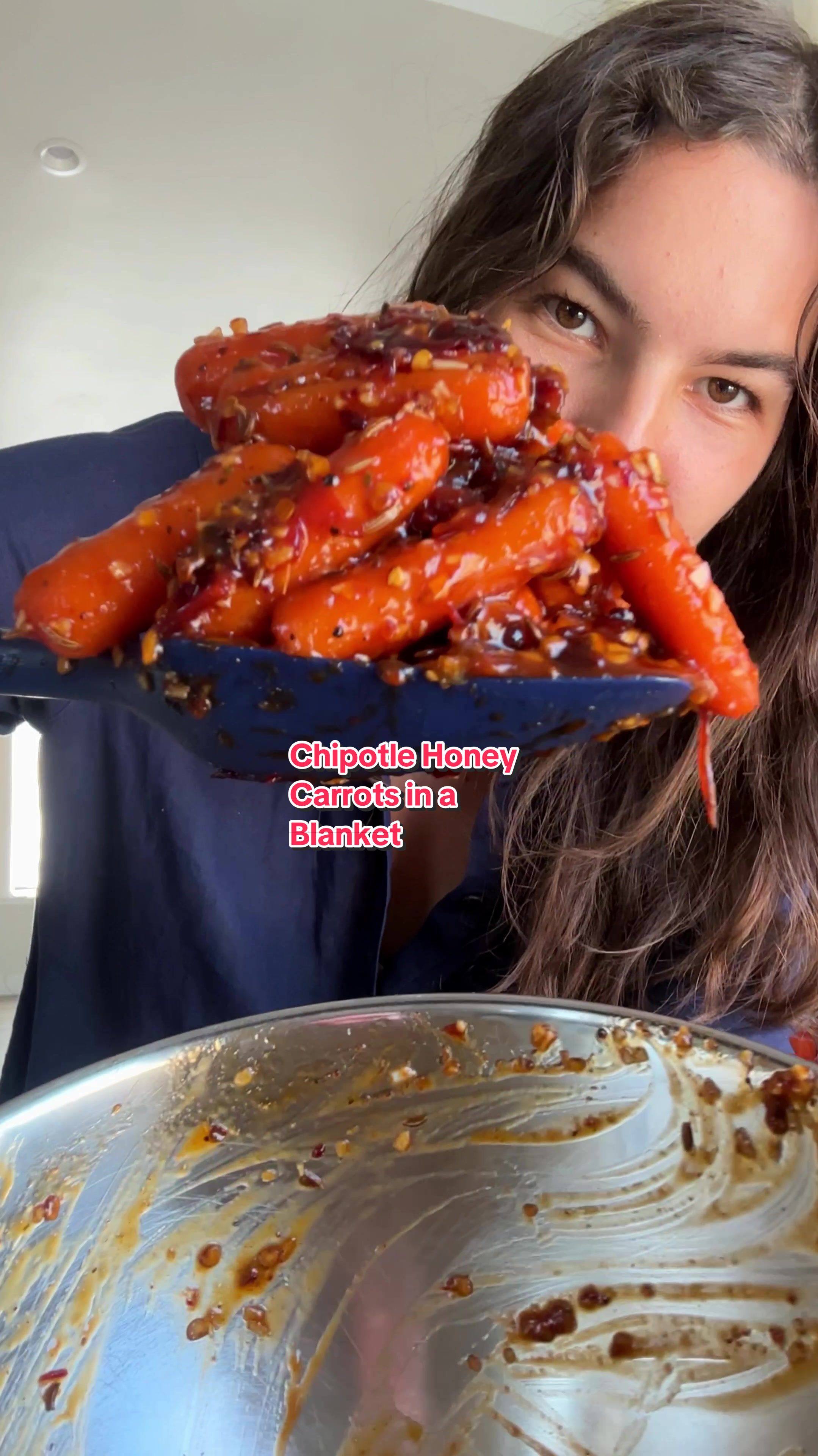 TikTok post by @carolinagelen for Mark's Daily Apple. Caption reads: HONEY CHIPOTLE CARROTS IN A BLANKET....