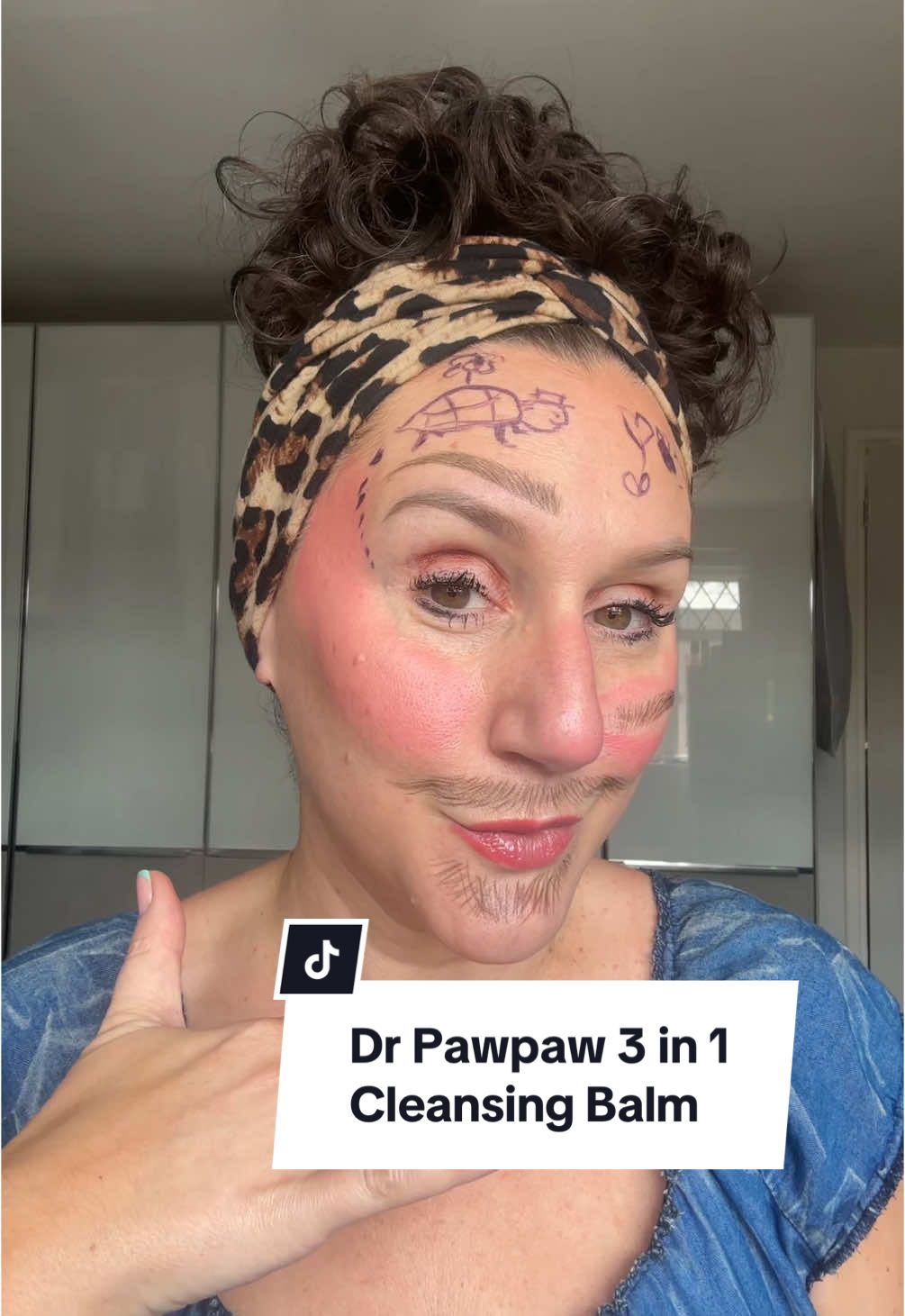 TikTok post by @makeupbykaty_angelidi for Dr.pawpaw. Caption reads: [...] layers of waterproof mascara and this....