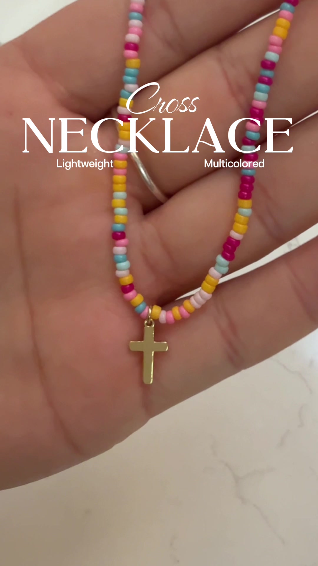 TikTok post by @lakenmakale for VENOCO. Caption reads: [...] the gold cross. It’s a yes for me!! @VENOCO....