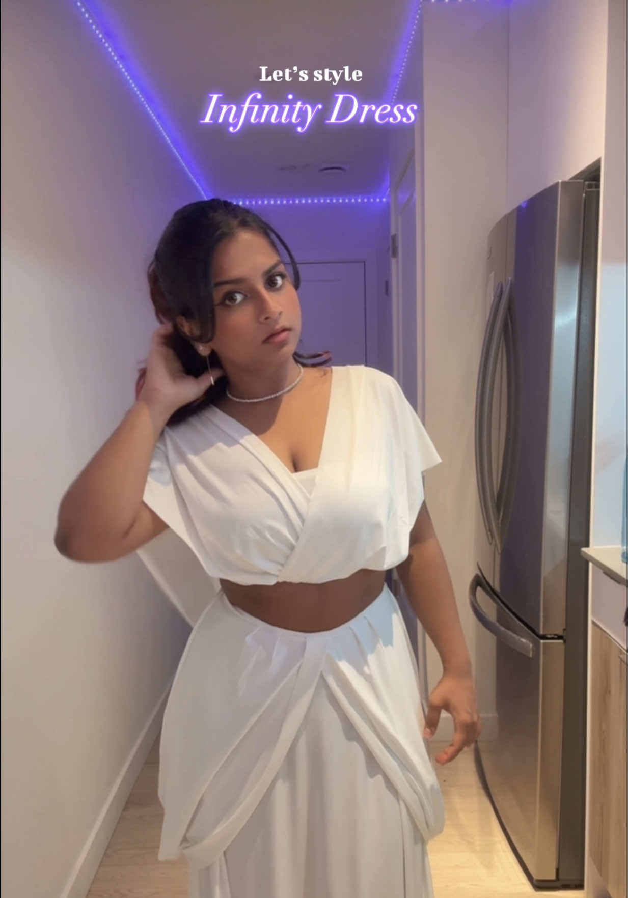 TikTok post by @tripti9502 for InfinityDress. Caption reads: [...] the Multiway Convertible Dress from....