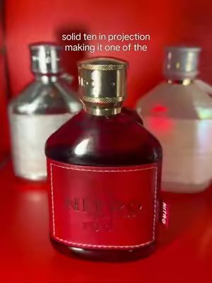 TikTok post by @swaggdaddy031 for PerfumeboxUSA. Caption reads: @perfumeboxusa #nitrored.