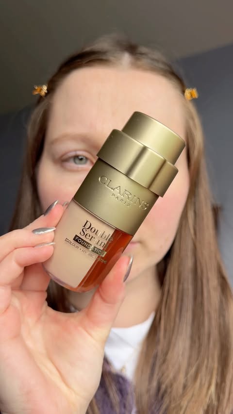 Instagram post by @milkandhonie for Clarins. Caption reads: The coverage on the new @clarinsuk Double Serum....