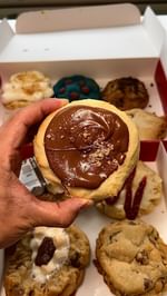 Instagram post by @seattlefoodieadventure for Crave Cookies. Caption reads: Crave cookies NEW 2nd location in Western [...].