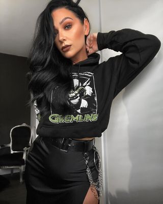 Instagram post by @dannieemay for Zavvi. Caption reads: #ad| @zavviuk killing it with these hoodies!....